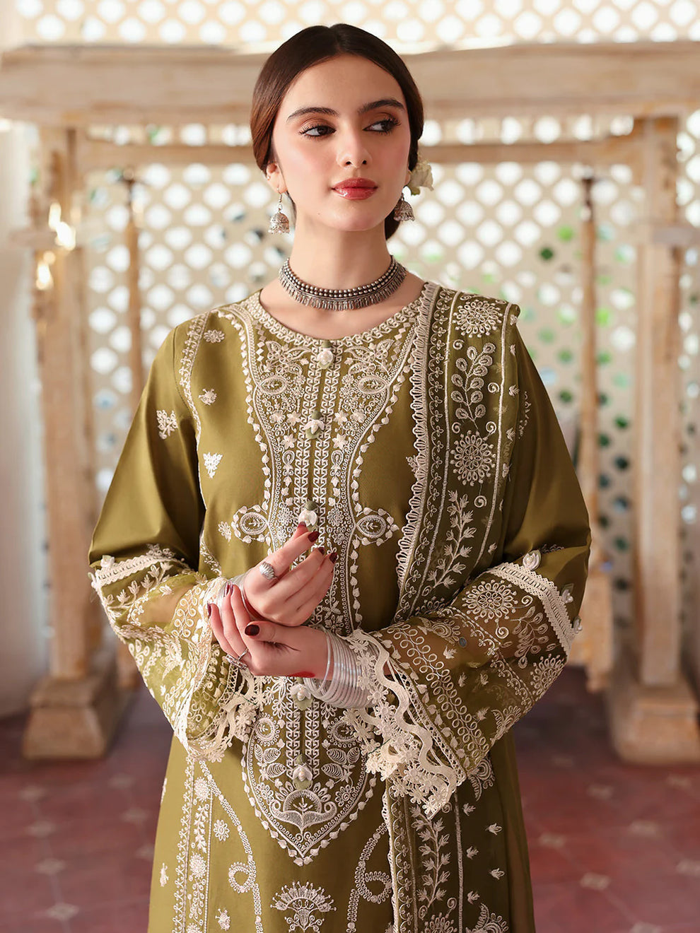 Olive Noorey embroidered suit detail model view